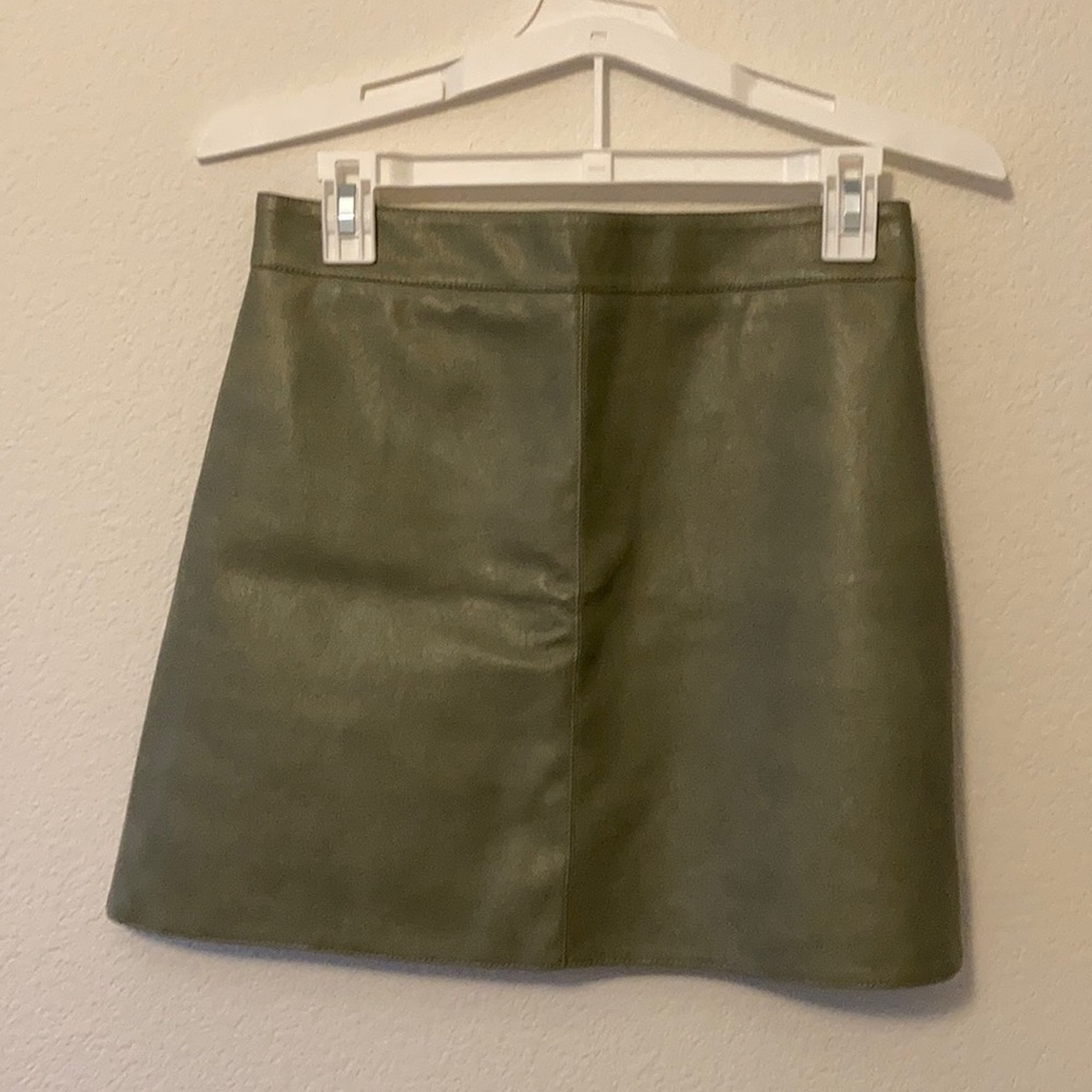 Green leather mini skirt